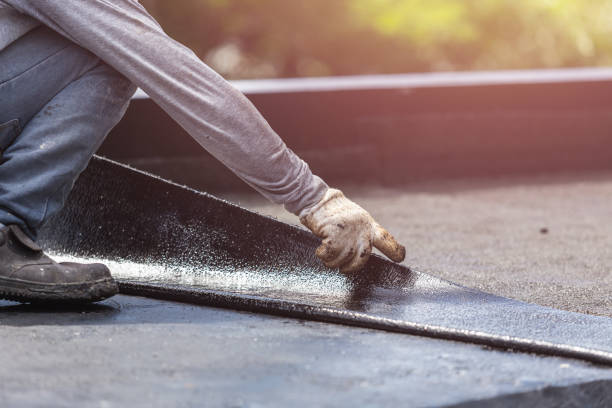Professional Basement Waterproofing technician working in Alfred Station, NY